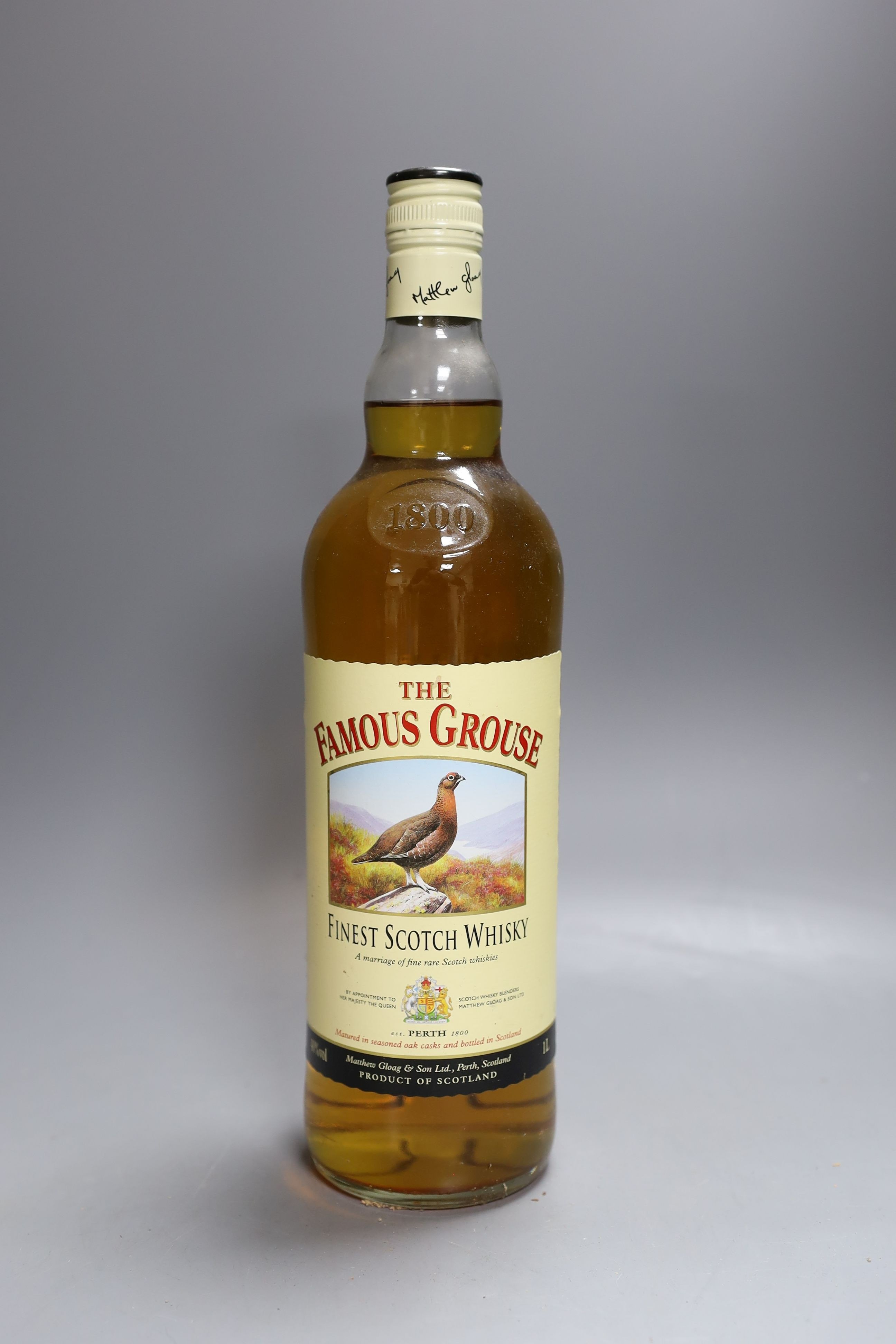 Thirteen single litre bottles of The Famous Grouse scotch whisky